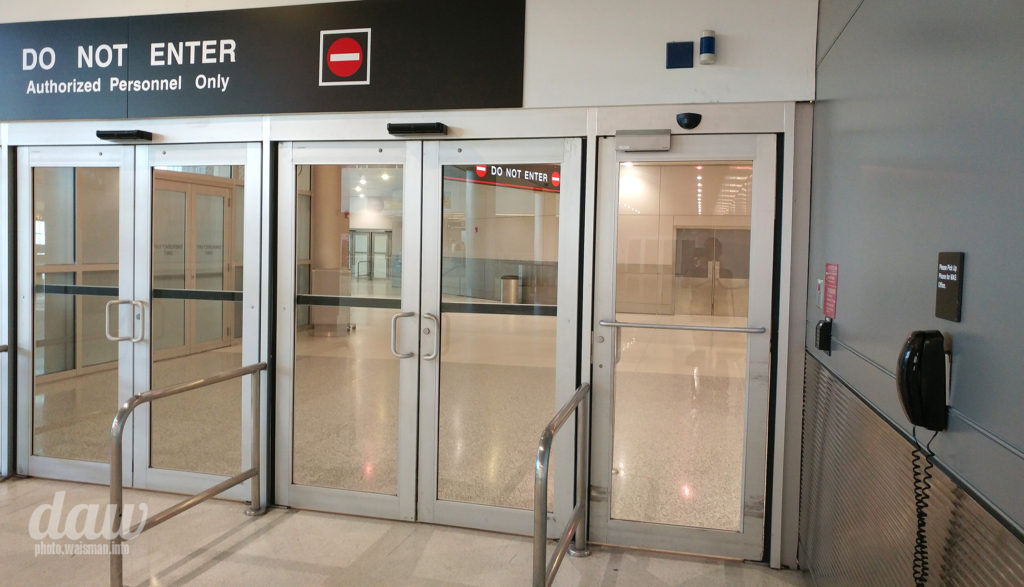 Entrance_customs_doors_phone_MIA_International_terminal_J